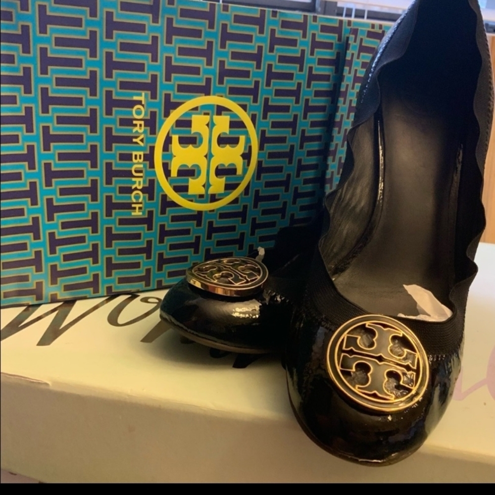 Tory Burch Black and Gold Flats with Decorative Medallion